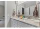 Elegant bathroom with dual sinks, a granite countertop, and brushed nickel faucets at 137 Low Tide Ct, Charleston, SC 29492