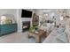 Inviting living room with a fireplace, comfortable seating, and stylish accents at 137 Low Tide Ct, Charleston, SC 29492