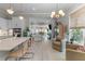 Open-concept living space with kitchen, dining, and sitting areas at 137 Low Tide Ct, Charleston, SC 29492