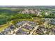 Aerial view of a Primary-planned community featuring ponds and tree-lined streets at 139 Clear Bend Ln, Summerville, SC 29486