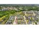An aerial view of a Primary-planned community featuring lush landscaping, serene ponds, and beautifully constructed single-Gathering homes at 139 Clear Bend Ln, Summerville, SC 29486