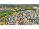 Aerial view of a Primary-planned community featuring ponds and tree-lined streets at 139 Clear Bend Ln, Summerville, SC 29486