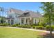 Beautiful street view of a charming low country style home with a landscaped yard and inviting porch at 139 Clear Bend Ln, Summerville, SC 29486