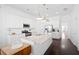 Bright kitchen features white cabinetry, stainless steel appliances, and granite countertops at 139 Clear Bend Ln, Summerville, SC 29486