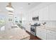 Bright kitchen features stainless steel appliances, granite countertops, and an island at 139 Clear Bend Ln, Summerville, SC 29486