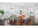 Bright, open kitchen features white cabinets, stainless appliances, and a breakfast area for modern convenience at 139 Clear Bend Ln, Summerville, SC 29486