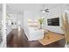 Bright living room with hardwood floors, ceiling fan, and an open floor plan for easy living at 139 Clear Bend Ln, Summerville, SC 29486
