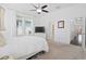 Serene main bedroom with a ceiling fan, carpeted floors, and natural light at 139 Clear Bend Ln, Summerville, SC 29486