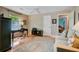 Inviting living area with hardwood floors, comfortable seating, and well-lit desk space at 1391 Southlake Dr, Mount Pleasant, SC 29464