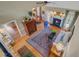 Aerial view showcases an open-concept living area with fireplace, hardwood floors, and dining space at 1391 Southlake Dr, Mount Pleasant, SC 29464