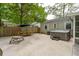 Backyard featuring a hot tub, outdoor dining set, and plenty of space for entertaining at 14 Paula Dr, Charleston, SC 29407