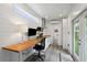 Stylish kitchen and office space featuring sleek countertops, stainless steel appliances, and ample natural light at 14 Paula Dr, Charleston, SC 29407
