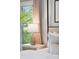 Close-up of the bedroom showing the night stand, lamps, and neutral-toned decor at 14 Paula Dr, Charleston, SC 29407