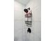Modern shower featuring gray tile and a sleek black shower fixture with a convenient storage rack at 14 Paula Dr, Charleston, SC 29407