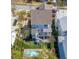 Aerial view of a home with a pool, landscaped yard, outdoor lounge area and a charming pergola-covered deck at 1427 Wando View St, Charleston, SC 29492