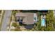 An aerial view of a beautifully landscaped home with a private pool and outdoor entertainment area at 1427 Wando View St, Charleston, SC 29492