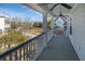 Spacious balcony with a ceiling fan and neighborhood views at 1427 Wando View St, Charleston, SC 29492