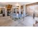 Large basement featuring a ping pong table, wooden staircase, and concrete flooring, ideal for recreation at 1427 Wando View St, Charleston, SC 29492