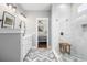 Modern bathroom featuring shower, vanity, and herringbone tile at 1427 Wando View St, Charleston, SC 29492