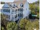 Exterior elevation with double decks, white railings, and blue siding at 1427 Wando View St, Charleston, SC 29492