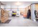 Spacious and well-lit garage with ample storage space and stairs to a living space at 1427 Wando View St, Charleston, SC 29492