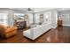 Comfortable living room featuring hardwood floors, large windows, and modern furniture at 1427 Wando View St, Charleston, SC 29492
