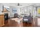 Cozy living room boasts a fireplace, media center, comfortable seating, and lots of natural light from large windows at 1427 Wando View St, Charleston, SC 29492