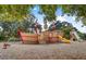 A playful pirate ship themed playground with slides and climbing structures surrounded by trees at 1427 Wando View St, Charleston, SC 29492