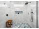 Modern shower featuring rain shower head, niche, and herringbone tile at 1427 Wando View St, Charleston, SC 29492