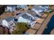 An aerial view of lovely homes in a waterside community with manicured lawns at 1464 Stratton Pl, Mount Pleasant, SC 29466