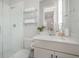 Modern bathroom featuring a glass-enclosed shower, sleek vanity, and stylish fixtures at 1464 Stratton Pl, Mount Pleasant, SC 29466