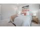 Bright bedroom featuring a plush bed, side tables, and stylish decor, a serene retreat at 1464 Stratton Pl, Mount Pleasant, SC 29466
