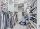 Walk-in closet with custom shelving and plenty of space for storage and organization at 1464 Stratton Pl, Mount Pleasant, SC 29466