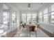 Stylish dining area with access to the outdoors and seating for six at 1464 Stratton Pl, Mount Pleasant, SC 29466