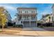 Attractive two-story home with a well-kept lawn, complemented by a welcoming front porch and a convenient driveway at 1464 Stratton Pl, Mount Pleasant, SC 29466