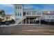 A lovely two-story home featuring a spacious deck and elevated construction at 1464 Stratton Pl, Mount Pleasant, SC 29466