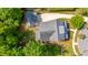 Aerial shot of home, showcasing the roof, driveway, mature trees, and surrounding neighborhood at 1510 Windlass Way, Mount Pleasant, SC 29466