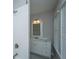 Bright bathroom boasts a marble vanity, white subway tile shower, and modern fixtures at 1510 Windlass Way, Mount Pleasant, SC 29466