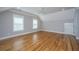 Bedroom with hardwood floors, neutral walls, a ceiling fan, and ample natural light at 1510 Windlass Way, Mount Pleasant, SC 29466