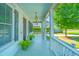 Inviting front porch with charming details and ample space for seating, perfect for relaxing outdoors at 1510 Windlass Way, Mount Pleasant, SC 29466