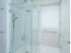 Modern bathroom with a frameless glass shower enclosure, marble tile surround, and a hand-held shower head at 1510 Windlass Way, Mount Pleasant, SC 29466
