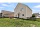 View of the back of the house with a small patio and fenced-in yard at 1516 Mandarin Ct, Summerville, SC 29483