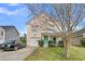 Beautiful two-story home featuring an attached garage and a well-maintained front yard at 1516 Mandarin Ct, Summerville, SC 29483