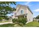Exterior view of a two-story home with blue shutters and manicured landscaping at 1516 Mandarin Ct, Summerville, SC 29483