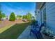 Inviting back patio with blue Adirondack chairs, ideal for outdoor relaxation and enjoyment at 1521 Pogonia St # 4, Mount Pleasant, SC 29466
