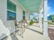 Inviting porch with seating, offering a relaxing outdoor space at 1521 Pogonia St # 4, Mount Pleasant, SC 29466