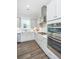 Updated kitchen featuring stainless appliances, white subway tile backsplash, and white shaker cabinets at 1521 Pogonia St # 4, Mount Pleasant, SC 29466
