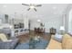 Open-concept living space featuring a kitchen with island and living area at 1521 Pogonia St # 4, Mount Pleasant, SC 29466