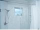 Modern tiled shower with glass door and chrome fixtures at 1521 Pogonia St # 4, Mount Pleasant, SC 29466