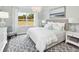 Serene bedroom with plush bedding, natural light, and stylish decor at 154 Royal Cainhoy Way, Huger, SC 29450